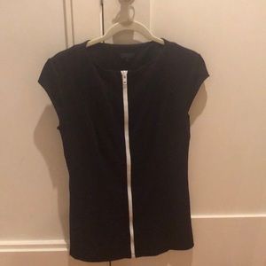 Black Privee top with white zipper.